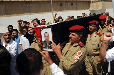 Obsèques des membres des forces de l'ordre syriennes tombés au cours de confrontations avec des opposants présumés pacifiques et désarmés
