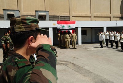 Obsèques des membres des forces de l'ordre syriennes tombés au cours de confrontations avec des opposants présumés pacifiques et désarmés
